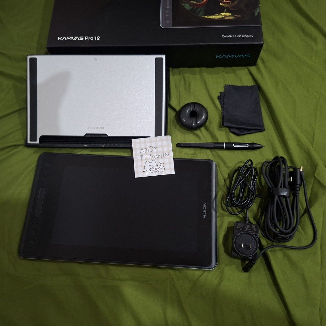 Huion Kamvas Pro 12 Drawing Tablet (Category: Other Mobile & Gadget Accessories) located in Marikina City. Submitted by andydandy07 (Listing ID 1471396318, Image 2). Description: Bought around Oct 2024 at the orange app for 8k+, lightly used since I prefer traditional drawing. Accessories are complete..