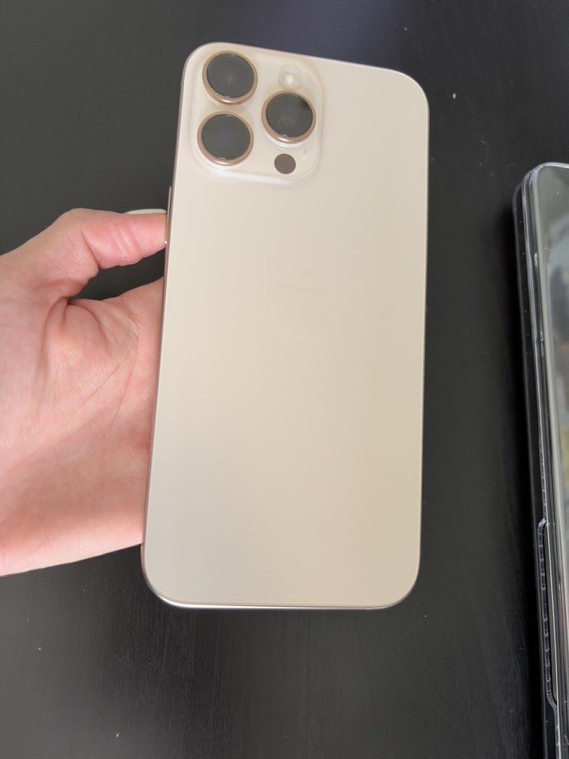 Iphone 16 Pro Max 256gb - Desert Titanium (Category: iPhone 16 Series) located in Pasig City. Submitted by wandererscab_2.0 (Listing ID 1471314598, Image 2). Description: 💯 no issues, no dents and scratches, excellent working condition, battery is very good!! Will still pass as brand new Never refurbished or repaired!! Lady owned since day 1 First use: April 2025 (use only for 1 year 6 months) Battery Health: 91% Inclusions: original box, chargi