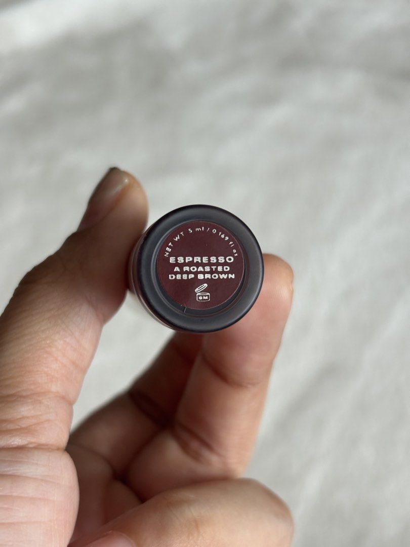 issy mousse Lip Tint in Espresso (Category: Makeup) located in Quezon City. Submitted by haha10_4 (Listing ID 1471343033, Image 2). Description: - Brand: Issy - Shade: Espresso (Roasted deep brown) - Size: 5 ml / 0.169 fl oz - Application: Standard doe-foot applicator - Packaging: Silver tube - Condition: Swatched once on the back of hand, zero flaws on tube or wand - Grab it now before it goes!.