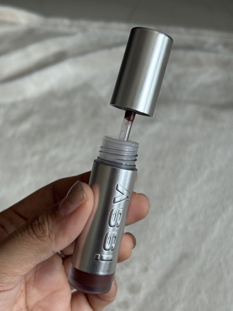 issy mousse Lip Tint in Espresso (Category: Makeup) located in Quezon City. Submitted by haha10_4 (Listing ID 1471343033, Image 3). Description: - Brand: Issy - Shade: Espresso (Roasted deep brown) - Size: 5 ml / 0.169 fl oz - Application: Standard doe-foot applicator - Packaging: Silver tube - Condition: Swatched once on the back of hand, zero flaws on tube or wand - Grab it now before it goes!.