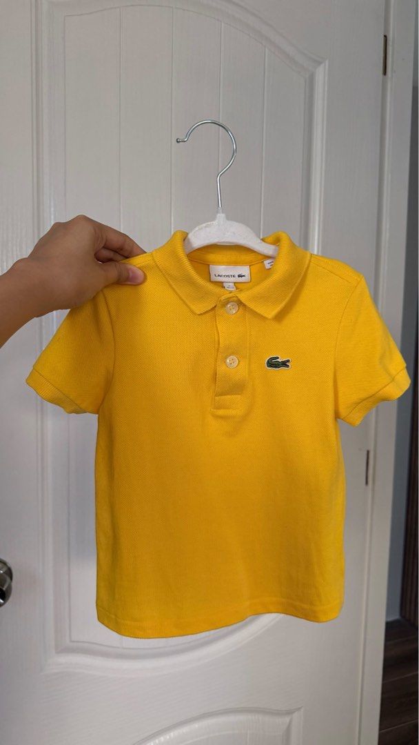 Lacoste polo for kids 2A (Category: Babies & Kids Fashion) located in Cavite. Submitted by lz.closet (Listing ID 1471448708, Image 1). Description: Lacoste polo for kids 2a yellow fit 1-3 years old Likenew condition no issue Authentic.