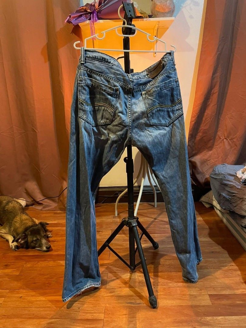Lee Denim Jeans Size 34 (Category: Jeans) located in Quezon City. Submitted by prelovedbyrocky (Listing ID 1471407506, Image 3). Description: - Brand: Lee - Size: 34 - Color: Blue wash - Material: 100% pure cotton - Fit: Classic straight leg - Design: Not four, but five-pocket style with contrast stitching on back pockets XD - Closure: Standard button and zipper fly - Condition: Great for pairing with casual tees and hoodies.