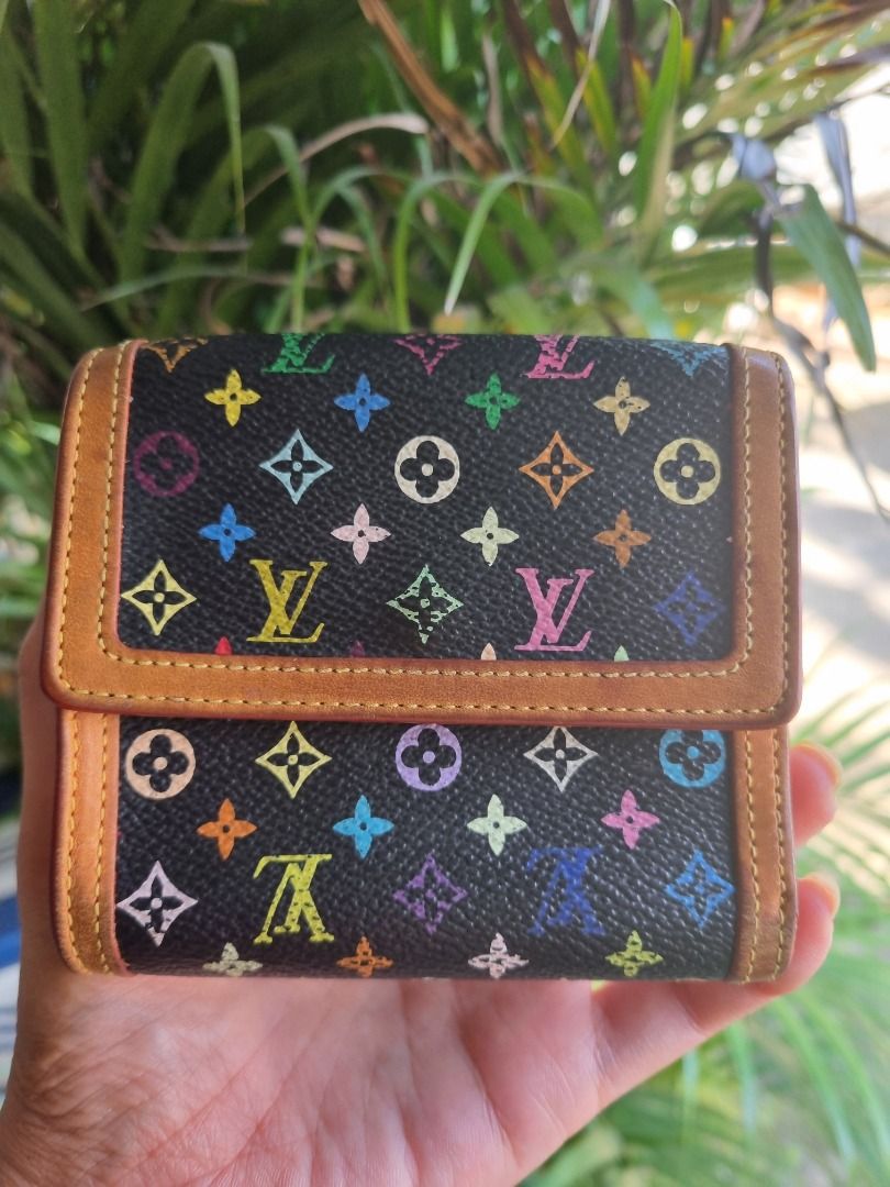 Louis Vuitton Black Monogram Multicolore Elise Wallet (Category: Luxury Bags & Wallets) located in Valenzuela. Submitted by bunnybugs43383 (Listing ID 1471301064, Image 2). Description: This is an AUTHENTIC Louis Vuitton Black Monogram Multicolore Elise Wallet is the most elegant way to organize your essentials like your bills, credit cards and plenty of coins. Overall Condition: Gently used Material: Black Multicolore Monogram canvas with natura