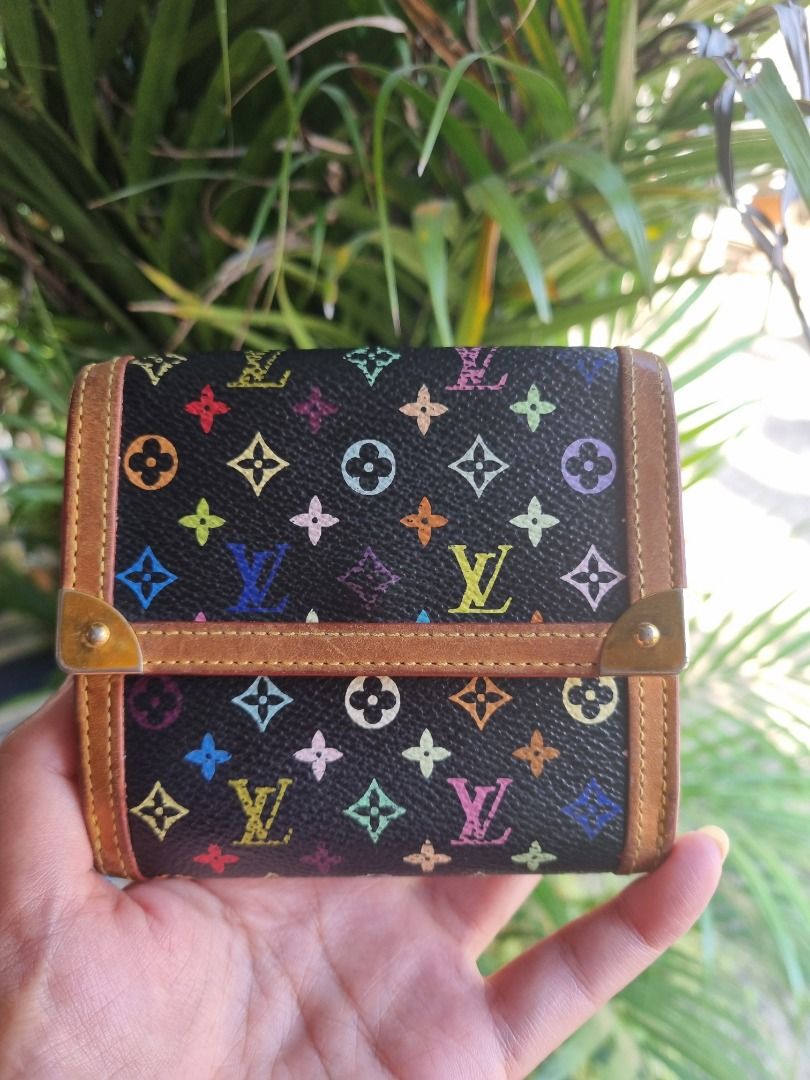 Louis Vuitton Black Monogram Multicolore Elise Wallet (Category: Luxury Bags & Wallets) located in Valenzuela. Submitted by bunnybugs43383 (Listing ID 1471301064, Image 1). Description: This is an AUTHENTIC Louis Vuitton Black Monogram Multicolore Elise Wallet is the most elegant way to organize your essentials like your bills, credit cards and plenty of coins. Overall Condition: Gently used Material: Black Multicolore Monogram canvas with natura