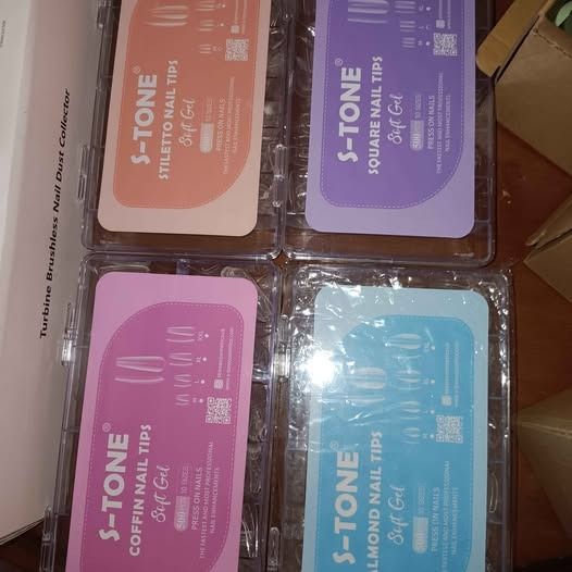 Nail Art Supplies Gel Polish Tips Drill Bits Set (Category: Hands & Nails) located in Paranaque City. Submitted by mgsantos18 (Listing ID 1471352461, Image 3). Description: - All-in-one nail art supply bundle for DIY or salon use - Soft gel nail tips in stiletto, square, coffin, and almond shapes - Assorted colored powders: cinnamon spice, snow white, serene, cotton candy, cherry blossom, and nude - Includes professional nail drill bits - Comes w