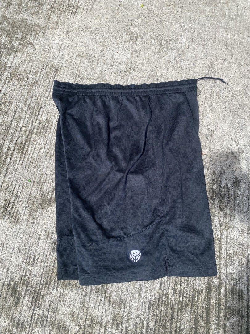 Nike black athletic shorts with white logo (Category: Shorts) located in Manila. Submitted by mystic.enrique_romulo (Listing ID 1471316469, Image 3). Description: - Brand: Nike - Color: Classic Black - Material: Lightweight, breathable mesh fabric - Fit: Comfortable elastic waistband - Design: Features small white Nike swoosh near bottom hem - Versatility: Ideal for workouts, lounging, or daily casual wear - Condition: Excellent / Ready to wear.