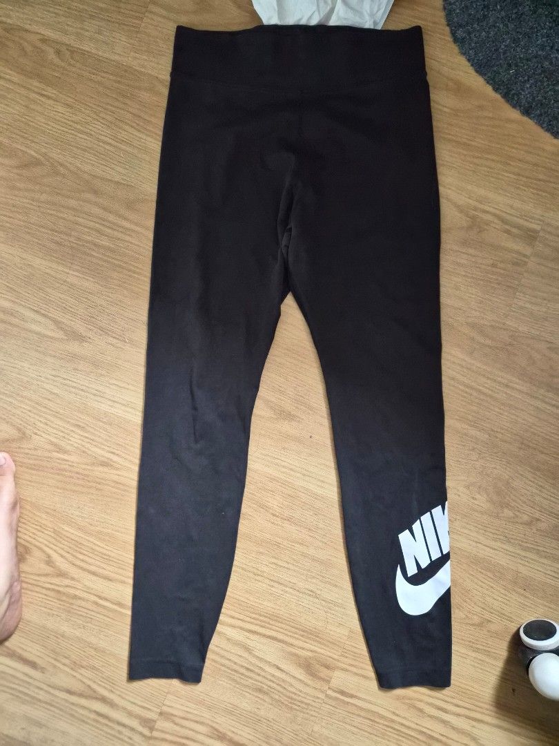 Nike Black Leggings with White Logo (Category: Activewear) located in Cavite. Submitted by frombellas (Listing ID 1471337707, Image 1). Description: - Brand: Nike - Color: Classic black with a bold white logo near the left hem - Fit: Comfortable wide waistband with super stretchy fabric - Condition: Excellent, clean, no tears or loose threads - Best for: Workouts, running errands, or casual lounging - Mode of Payment: GCash or BPI accepted - Ship