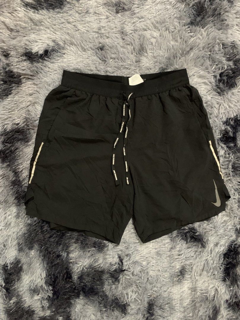 Nike Dri-FIT Running Shorts Black (Category: Activewear) located in Iba. Submitted by thriftcoyan (Listing ID 1471330416, Image 1). Description: - Brand: Nike Running shorts -Size Small -29-32 - Color: Black - Condition: Brand new with tags attached - Dri-FIT technology keeps you dry and comfortable - Lightweight material with side panels for enhanced movement - Branded drawstring waist for a secure fit - Reflective Nike swoosh for low-light visi