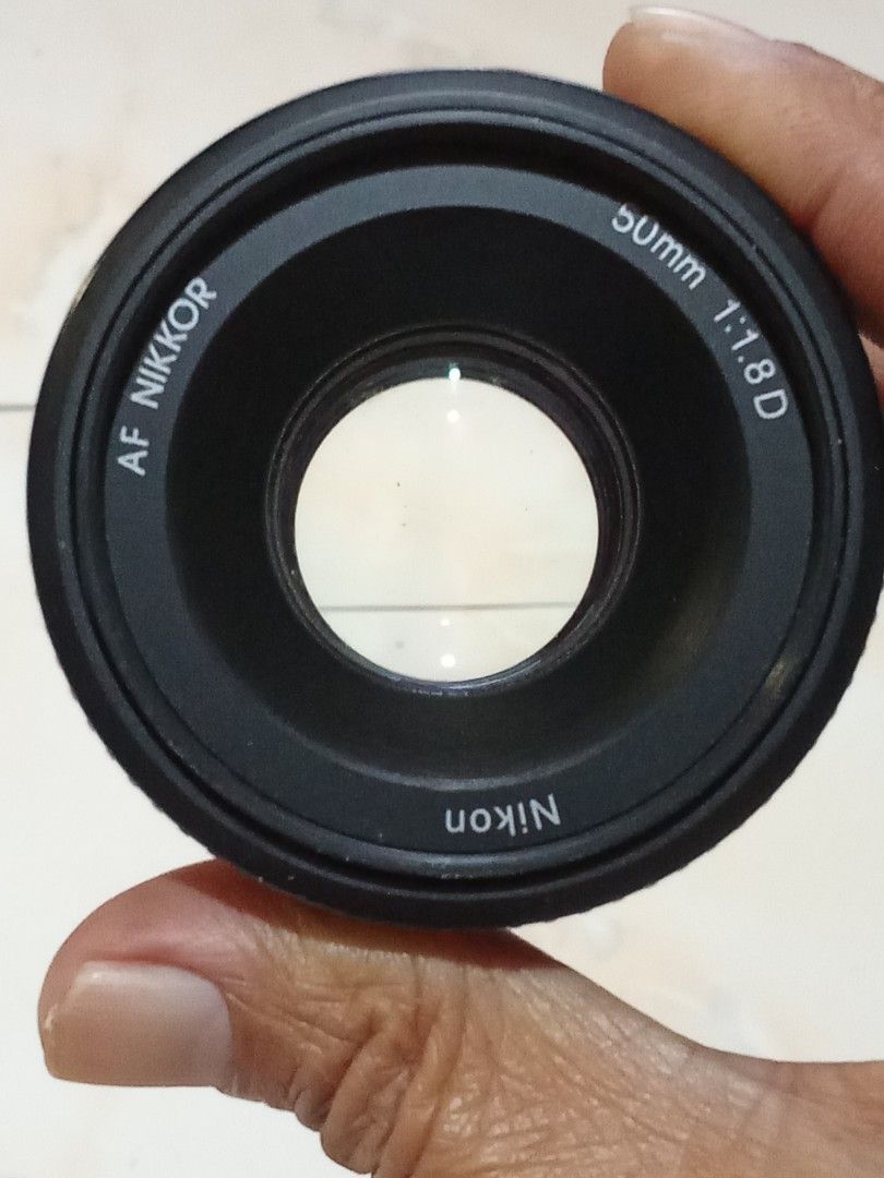 Nikkor AF 50mm 1:1.8D Prime Lens (Category: Lens & Kits) located in Manila. Submitted by mamatet.mamatetvasquez (Listing ID 1471335504, Image 1). Description: PTP ADMIN 🙋 Nikkor AF 50mm 1.8D Prime Lens CAN BE USE TO 👉 1) Nikon Semi-Pro Body 2) Nikon Entry Level Body in MF HONEST ISSUE : FADED MARKINGS Not affect the Working Condition & Image Output BEST FOR 👉 Video Recording Low Light Shooting Portrait Photography Bokeh or Blur Background PRIC