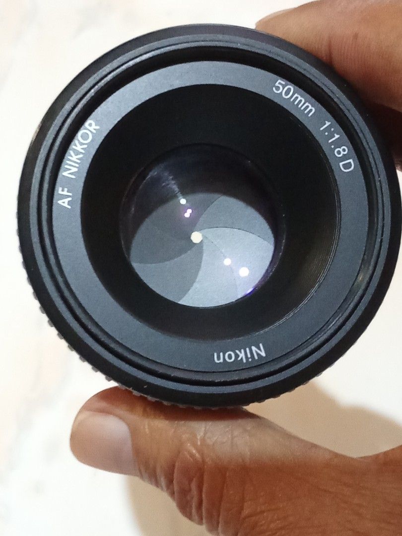 Nikkor AF 50mm 1:1.8D Prime Lens (Category: Lens & Kits) located in Manila. Submitted by mamatet.mamatetvasquez (Listing ID 1471335504, Image 2). Description: PTP ADMIN 🙋 Nikkor AF 50mm 1.8D Prime Lens CAN BE USE TO 👉 1) Nikon Semi-Pro Body 2) Nikon Entry Level Body in MF HONEST ISSUE : FADED MARKINGS Not affect the Working Condition & Image Output BEST FOR 👉 Video Recording Low Light Shooting Portrait Photography Bokeh or Blur Background PRIC