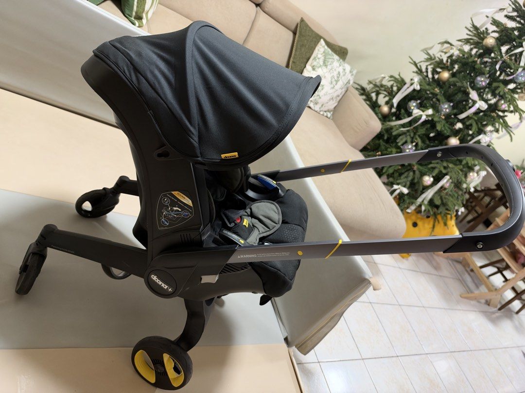 Original Doona+ Infant Car Seat and Stroller (Category: Car Seats) located in Pasig City. Submitted by athriftrack (Listing ID 1471314085, Image 2). Description: - Original Doona+ Infant Car Seat and Stroller in Black - Converts from car seat to stroller in just a few seconds - Includes newborn insert and vehicle seat protector mat and Baby on Board Car Sign - Fully working, mostly used as carseat for less; seldomly used outside - Ultimate space 