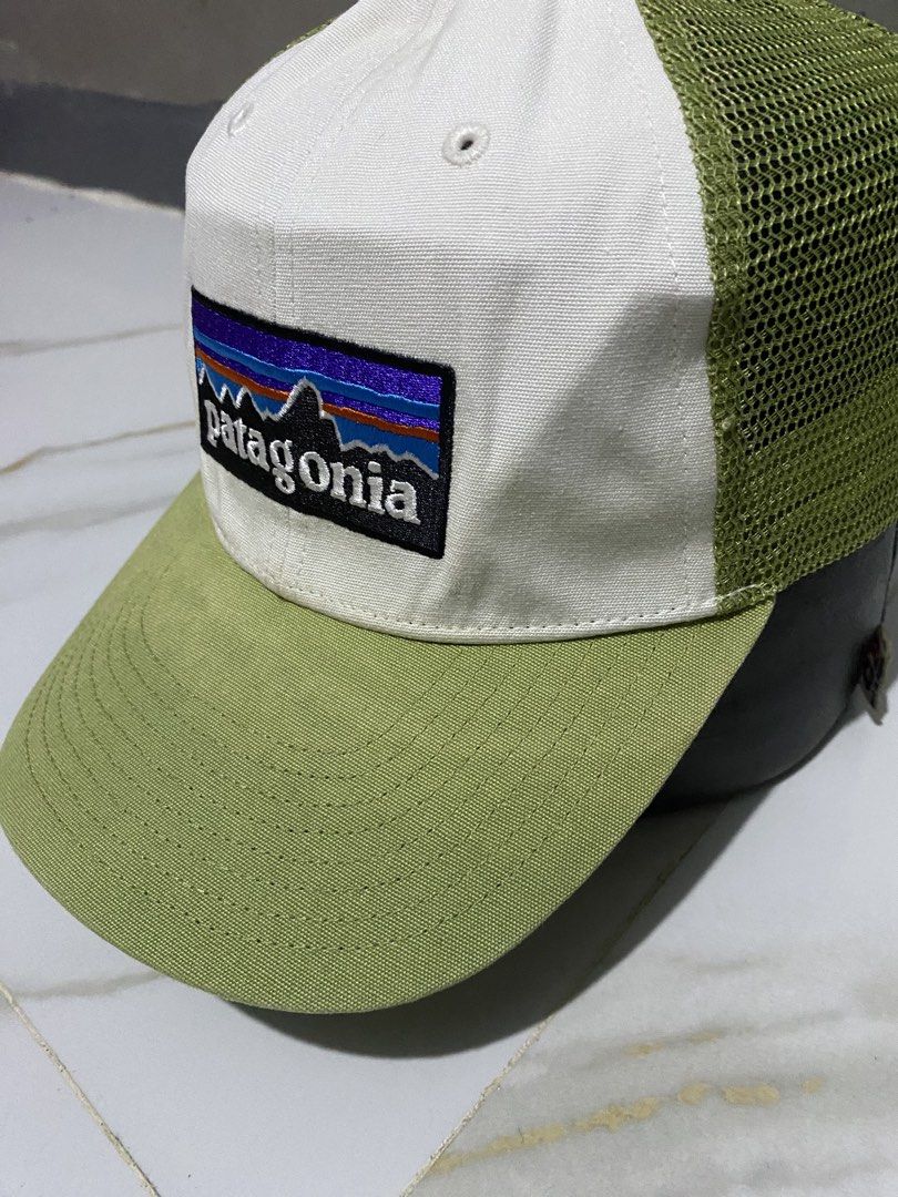 Patagonia Trucker Hat Green White (Category: Caps & Hats) located in Cabanatuan. Submitted by adrialesdrip (Listing ID 1471325993, Image 2). Description: - Authentic Patagonia trucker hat in green and white - Classic breathable mesh back design - Adjustable green snapback closure for a custom fit - Iconic embroidered mountain logo patch on the front - Features NetPlus sourced by Bureo interior label (Style: STY38283SP24) - Excellent, clean overal