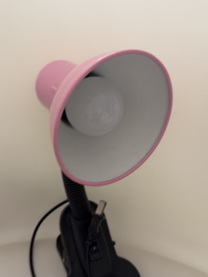 Pink Clip-On Desk Lamp with Flexible Neck | Adjustable LED Study Light (Category: Lighting) located in Manila. Submitted by wearsby_elismarg (Listing ID 1471341761, Image 2). Description: 🩷 Pink Clip-On Desk Lamp with Flexible Neck • Color: Pink • Features a convenient clip-on base for easy attachment to desks, shelves, and bedside tables • Flexible neck allows you to adjust the light direction as needed • Space-saving design, perfect for small 