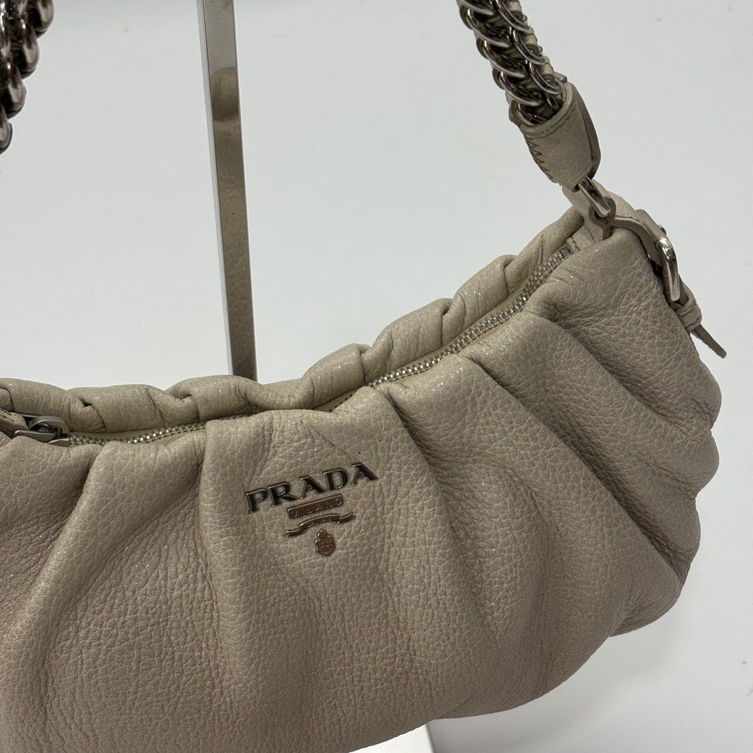 Prada Beige Cervo Chain strap Bag (Category: Luxury Bags & Wallets) located in Angeles City. Submitted by therandomstuff011 (Listing ID 1471412803, Image 3). Description: This is the Prada Beige Cervo Lux Leather Chain Strap Bag (Model BR3828), crafted from soft pebbled deer leather with a gathered/pleated body and a silver-tone chain-link shoulder strap.