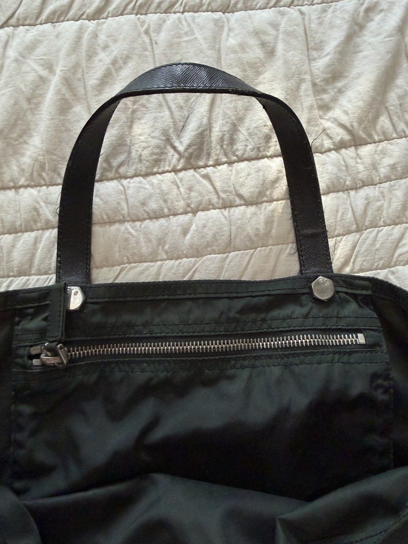prada green tote bag (Category: Luxury Bags & Wallets) located in Candaba. Submitted by localluna (Listing ID 1471298461, Image 3). Description: - needs cleaning .