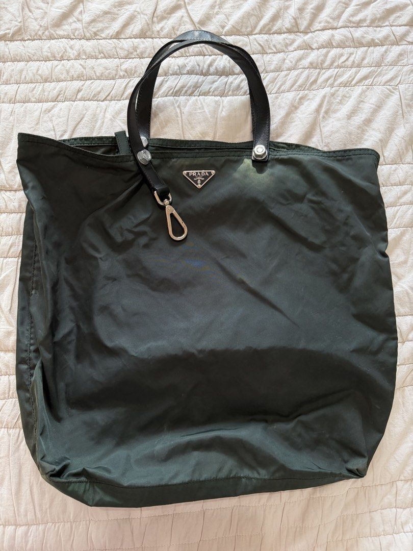 prada green tote bag (Category: Luxury Bags & Wallets) located in Candaba. Submitted by localluna (Listing ID 1471298461, Image 1). Description: - needs cleaning .