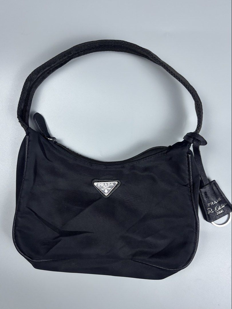 PRADA RE-EDITION 2000 MINI SHOULDER/KILI KILI BAG (Category: Luxury Bags & Wallets) located in Mabalacat. Submitted by doughnutthrift (Listing ID 1471423329, Image 1). Description: authenticity is not guaranteed .