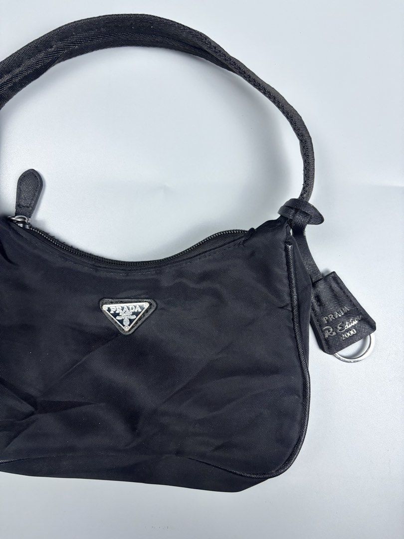 PRADA RE-EDITION 2000 MINI SHOULDER/KILI KILI BAG (Category: Luxury Bags & Wallets) located in Mabalacat. Submitted by doughnutthrift (Listing ID 1471423329, Image 3). Description: authenticity is not guaranteed .