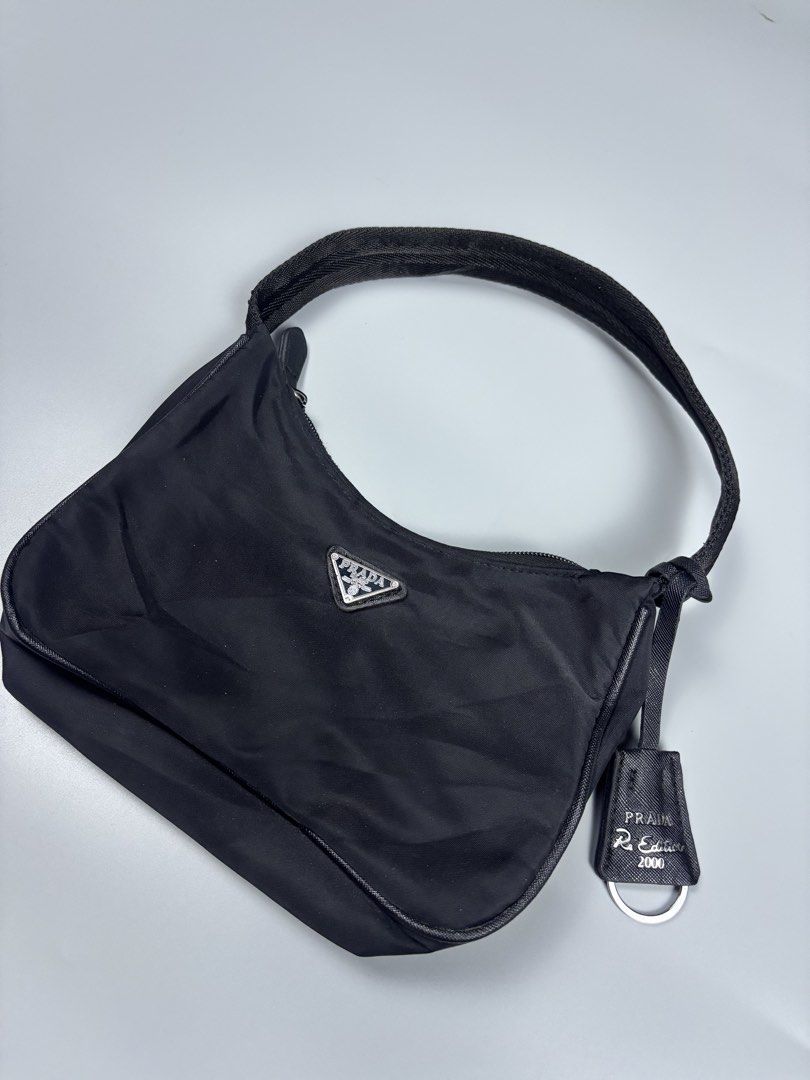 PRADA RE-EDITION 2000 MINI SHOULDER/KILI KILI BAG (Category: Luxury Bags & Wallets) located in Mabalacat. Submitted by doughnutthrift (Listing ID 1471423329, Image 2). Description: authenticity is not guaranteed .