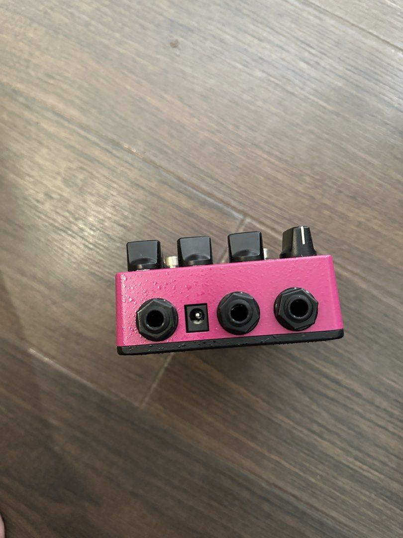 Providence Chrono Delay DLY-4 Guitar Effects Pedal (Category: Musical Instruments) located in Makati City. Submitted by heartbreakwarfare55 (Listing ID 1471364579, Image 2). Description: - Model: Providence Chrono Delay DLY-4 (Made in Japan) - Color: Vibrant pink with digital display screen - Features: Built-in analog mixer, Vitalizer circuit, and tap tempo - Controls: Beat split, mix, echo hardness, feedback, and time - I/O: Standard power input