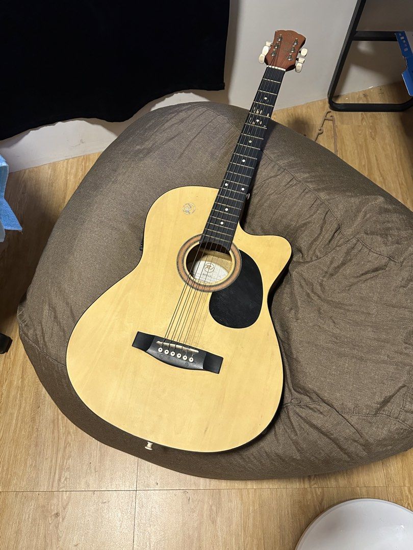 RJ Manila Acoustic Guitar (Category: Musical Instruments) located in Manila. Submitted by 5sos_bernard (Listing ID 1471319927, Image 1). Description: .