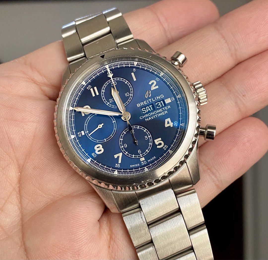 Rush! Breitling Navitimer Chronometer Blue Dial A13314 (Category: Luxury Watches) located in Manila. Submitted by junie_reyes (Listing ID 1471327899, Image 2). Description: Complete Box/Papers! Slightly Nego for sure buyers! - Model: Breitling Navitimer Chronograph (Ref. A13314) - Dial: Striking blue dial with Arabic numerals, day-date window at 3 o'clock, and three sub-dials - Bezel: Rotating bezel with iconic slide rule markings - Movement: Swi