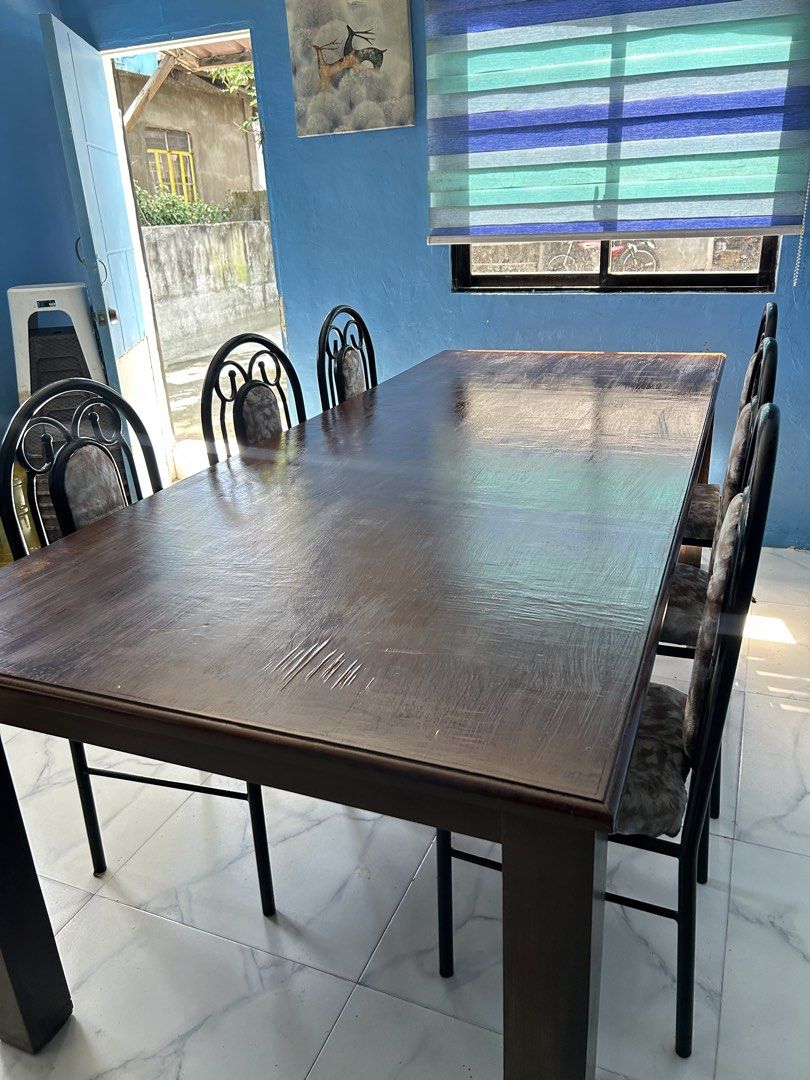 Solid Wood 10-Seater Dining Table (TABLE ONLY) (Category: Tables & Sets) located in San Fernando. Submitted by dcdaisyyy (Listing ID 1471345024, Image 1). Description: Selling our massive, heavy-duty 10-seater solid wooden dining table. This listing is for the TABLE ONLY (chairs are not included). Perfect if you already have chairs or want to upgrade your dining space with a beautiful, wide solid wood centerpiece! It also works wonderfully as a l