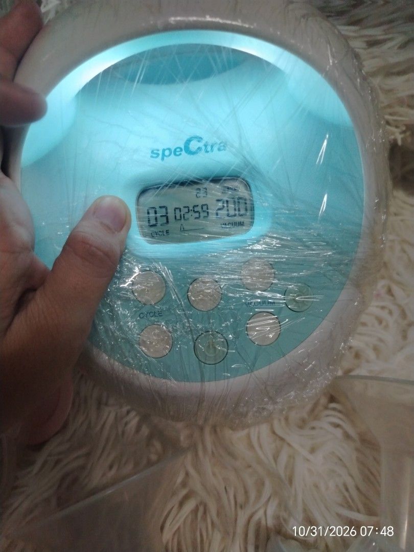 Spectra S2 Plus Premier Rechargeable Electric Breast Pump Set (Category: Breastfeeding & Bottle Feeding) located in Pulilan. Submitted by mjbabyproductsshop (Listing ID 1471298317, Image 2). Description: - Spectra S1 Plus premier rechargeable electric breast pump - Fully tested and powers on successfully - Includes main pump unit with digital display and built-in light - Comes with two collection bottles (pink rims), tubing, flanges, valves, and 