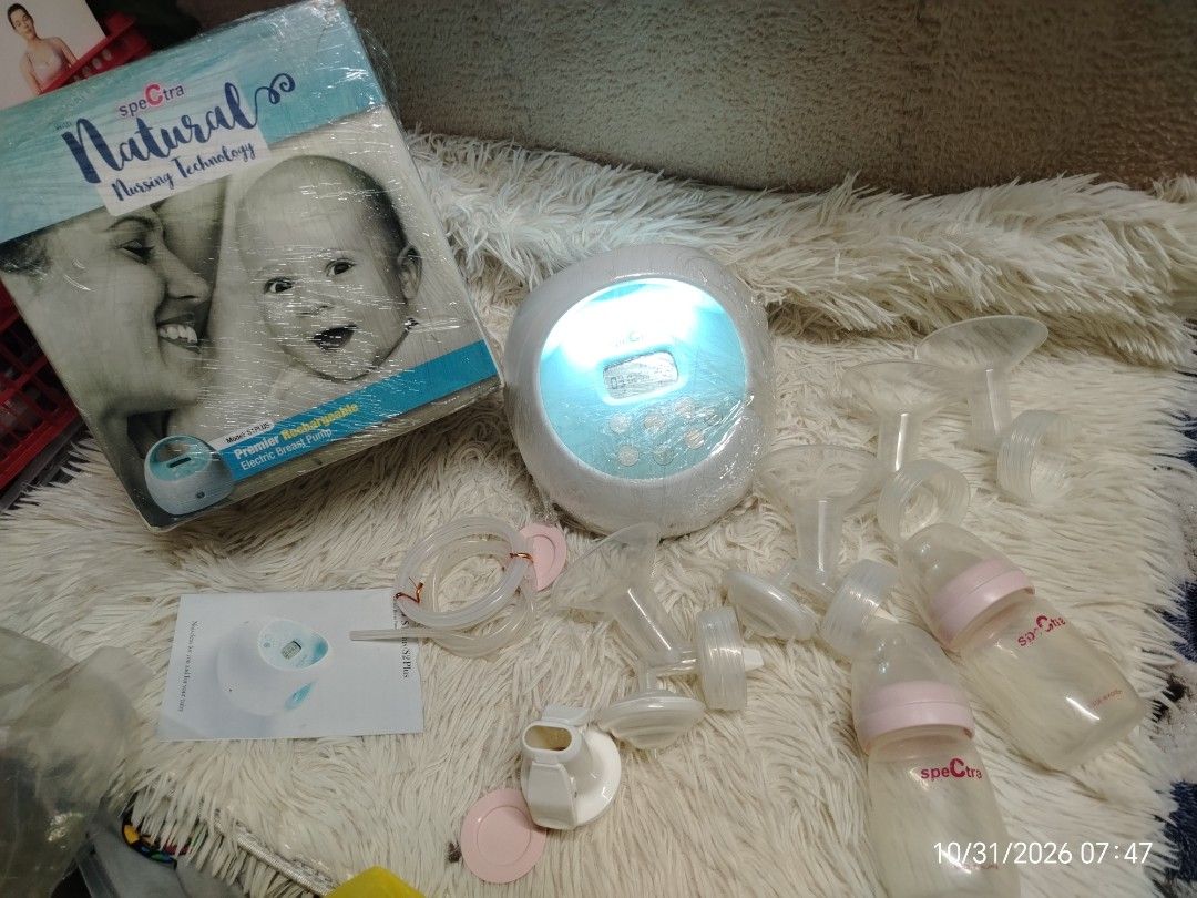 Spectra S2 Plus Premier Rechargeable Electric Breast Pump Set (Category: Breastfeeding & Bottle Feeding) located in Pulilan. Submitted by mjbabyproductsshop (Listing ID 1471298317, Image 1). Description: - Spectra S1 Plus premier rechargeable electric breast pump - Fully tested and powers on successfully - Includes main pump unit with digital display and built-in light - Comes with two collection bottles (pink rims), tubing, flanges, valves, and 