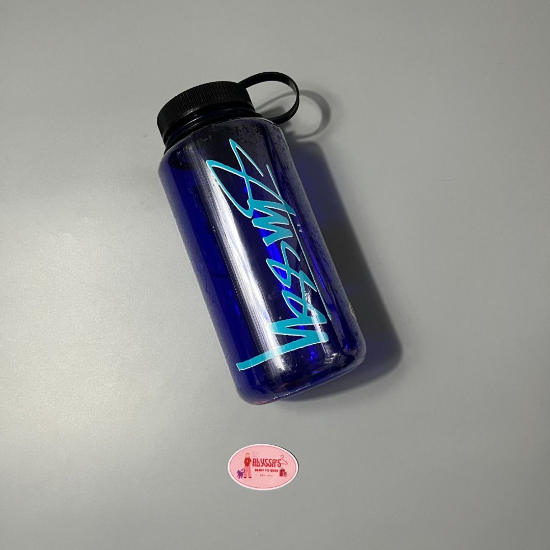 Stussy Nalgene-Style Reusable Water Bottle (Category: Water Bottles & Tumblers) located in Davao. Submitted by alyssaclosett (Listing ID 1471350063, Image 2). Description: The ultimate everyday carry accessory for the streets. This authentic Stüssy water bottle combines heavy-duty durability with iconic streetwear branding. Built tough for daily commutes, skate sessions, or gym grinds, it’s a functional collector's piece that keeps your hydration