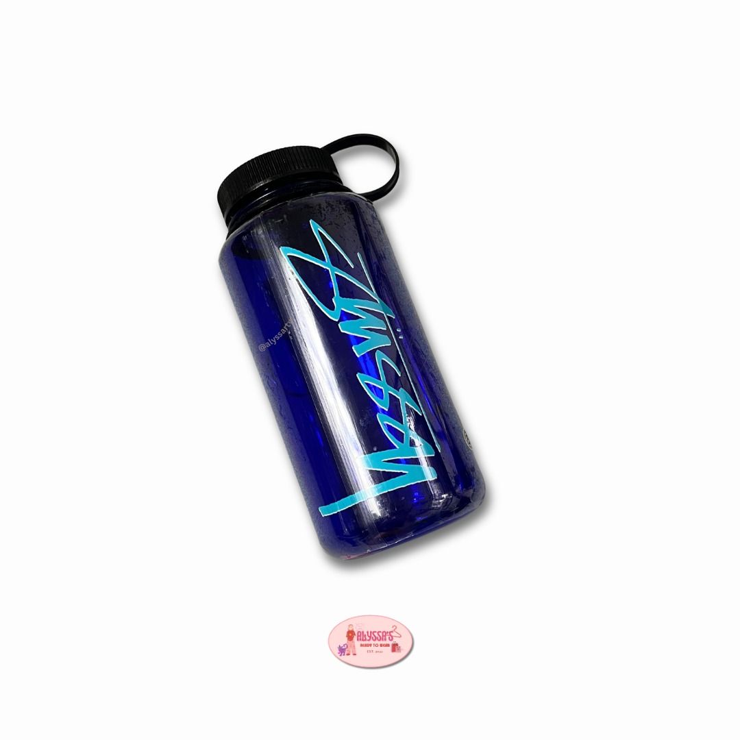Stussy Nalgene-Style Reusable Water Bottle (Category: Water Bottles & Tumblers) located in Davao. Submitted by alyssaclosett (Listing ID 1471350063, Image 1). Description: The ultimate everyday carry accessory for the streets. This authentic Stüssy water bottle combines heavy-duty durability with iconic streetwear branding. Built tough for daily commutes, skate sessions, or gym grinds, it’s a functional collector's piece that keeps your hydration