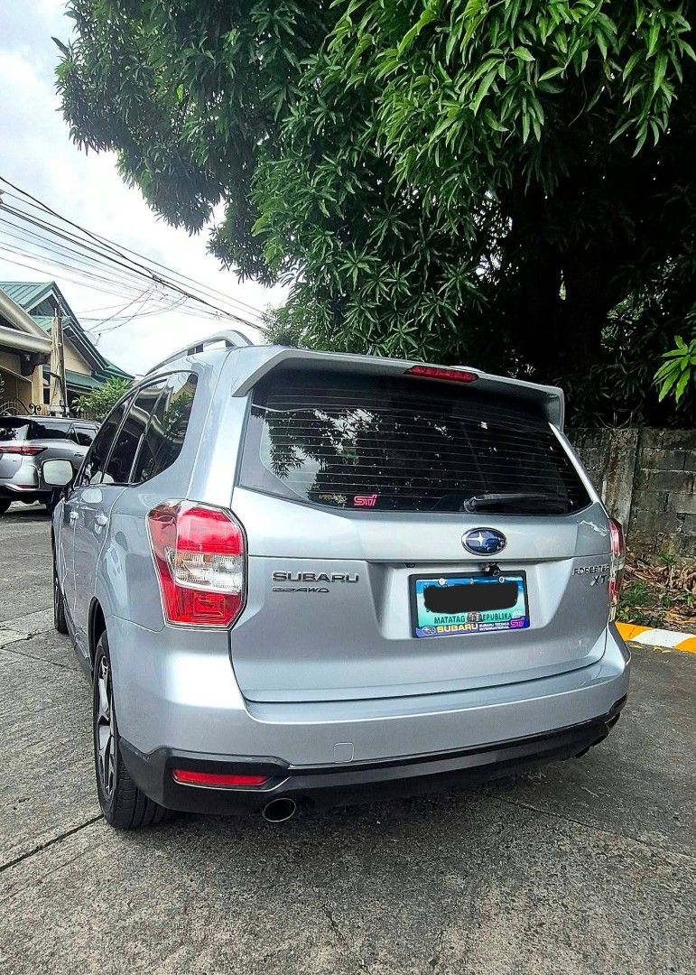 Subaru Forester 2.0 XT Auto (Category: Used Cars) located in Las Pinas. Submitted by ching2xclmarin (Listing ID 1467000335, Image 2). Description: 🔥 For Sale 🔥 2014 Subaru Forester XT AWD Turbo ✅️2.0L FA20DIT Turbocharged Boxer Engine ✅️240 HP / 350 Nm Torque ✅️Symmetrical Full-Time AWD ✅️Automatic Transmission CV noT ✅️Manual Mode + Paddle Shifters ✅️SI-Drive — Intelligent / Sports mode ✅️90% Thick Nexen Tires ✅️3M Tint ✅️STi plate frame Top o