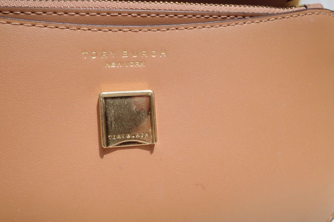 Tory Burch Britten Mixed Material Convertible Crossbody Bag (Category: Luxury Bags & Wallets) located in Antipolo. Submitted by bluelocker (Listing ID 1471330607, Image 2). Description: Decluttering! This is from my aunt’s personal collection. Used once, well kept in storage to preserve bag’s condition, no flaws, shipping care of buyer..