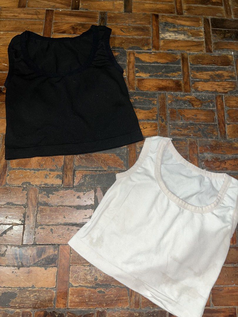 (TWO FOR 80) PADDED Black and White Crop Tank Top Bundle (Category: Sleeveless) located in Mandaluyong City. Submitted by copthatgirl (Listing ID 1471346705, Image 1). Description: PADDED - Bundle of 2 basic scoop neck crop tank tops (Black & Off-White) - Stretchy, comfortable fabric ideal for everyday layering - Off-White top: Has several noticeable stains near the bottom hem and front area - Selling as a set / All sales final.