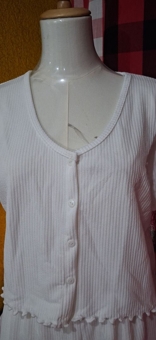 White Knit Short Sleeve Top and Shorts Set (Category: Sets or Coordinates) located in Manila. Submitted by katkween23 (Listing ID 1471339430, Image 2). Description: - Color: White - Material: Soft knit fabric - Set includes: Short sleeve top with button closure and lettuce hem + matching shorts with elastic waistband - Perfect for: Sleeping or lounging at home - Care: Easy to wash and maintain - Sizing: Standard sizing.