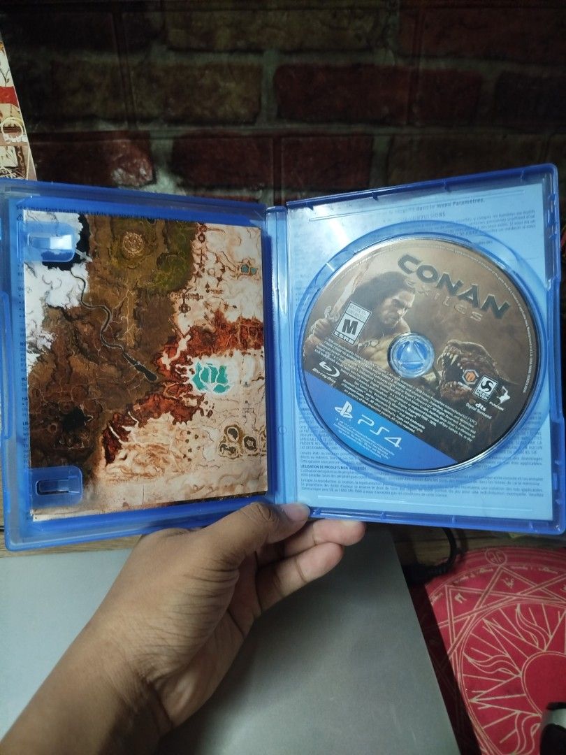(With Map) Conan Exiles Day One Edition PS4 Game (Category: PlayStation) located in Binan City. Submitted by pumpkiiin02 (Listing ID 1471306572, Image 3). Description: - Title: Conan Exiles Day One Edition for PlayStation 4 - Genre: Open-world survival set in the world of Conan the Barbarian - Inclusions: Original case, game disc, and insert map - Condition: Solid shape, well-maintained, and ready to play - Shipping or meet-up options available a
