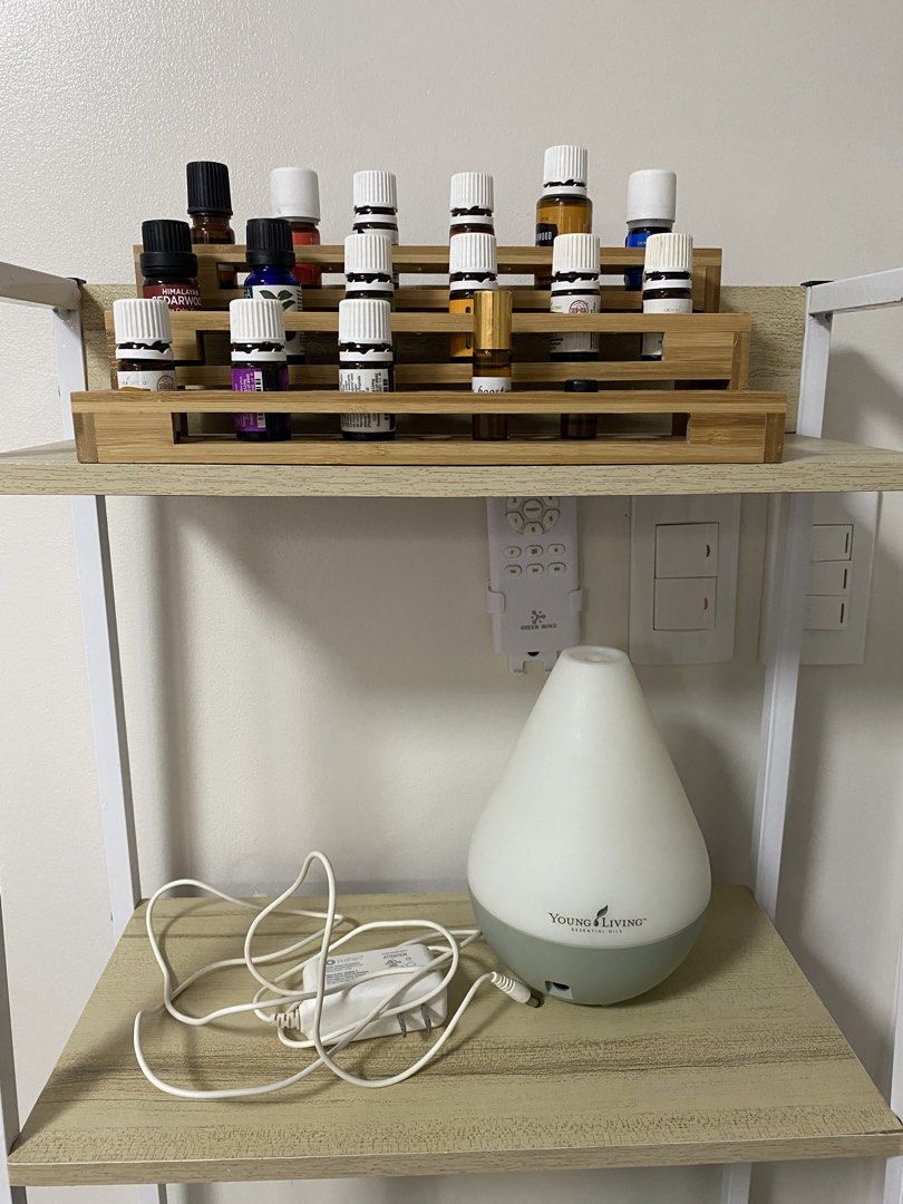 Young Living Dewdrop Essential Oil Diffuser (Category: Home Fragrance) located in Manila. Submitted by chayak (Listing ID 1471373213, Image 1). Description: - Authentic Young Living Dewdrop essential oil diffuser - Stylish white and green teardrop design - Includes original power adapter with a long white cord - Perfect for adding moisture and fragrance to any room - Clean, well-maintained, and works great - Comes with all the oils in photo and o