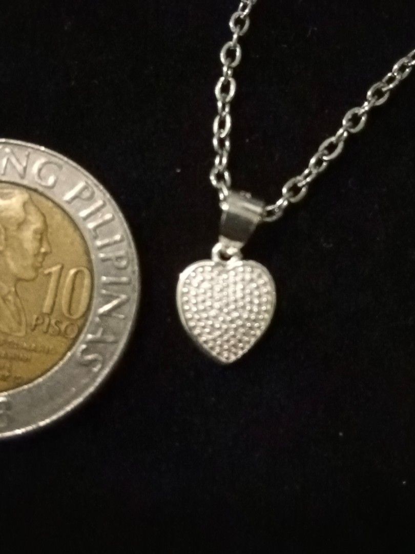 100% Legit 925 Silver Heart Pendant with FREE Stainless Steel Necklace (Category: Charms) located in Manila. Submitted by mhar_declutter (Listing ID 1427233827, Image 1). Description: 100% Legit Genuine 925 Silver Heart Pendant with FREE Stainless Steel Necklace.