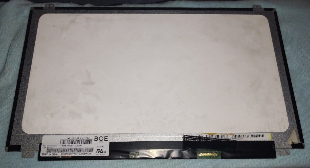15.6 slim 30 pins LCD laptop (Category: Laptops & Notebooks) located in Pasig City. Submitted by gj020 (Listing ID 1465893006, Image 3). Description: Brand new pull-out 15.6" laptop screen replacement (Model: NT156WHM-N12 V8.0). Features 1366x768 HD resolution and a bottom-right 30-pin connector. Fully tested and 100% working. Perfect for repairing cracked or broken laptop displays..