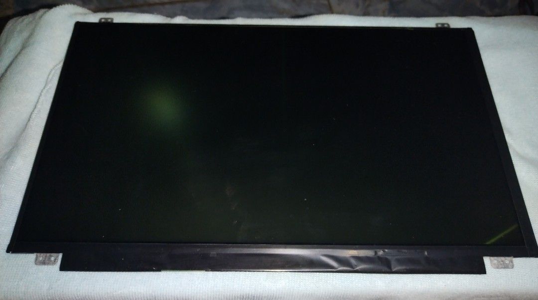 15.6 slim 30 pins LCD laptop (Category: Laptops & Notebooks) located in Pasig City. Submitted by gj020 (Listing ID 1465893006, Image 2). Description: Brand new pull-out 15.6" laptop screen replacement (Model: NT156WHM-N12 V8.0). Features 1366x768 HD resolution and a bottom-right 30-pin connector. Fully tested and 100% working. Perfect for repairing cracked or broken laptop displays..