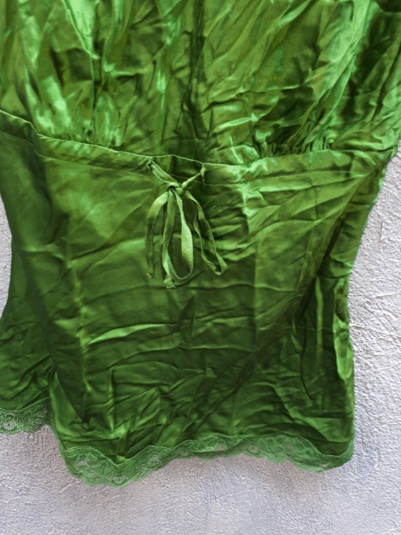 16x27 green silk top (Category: Sleeveless) located in Quezon City. Submitted by secretluxuryshop (Listing ID 1465802577, Image 3). Description: .