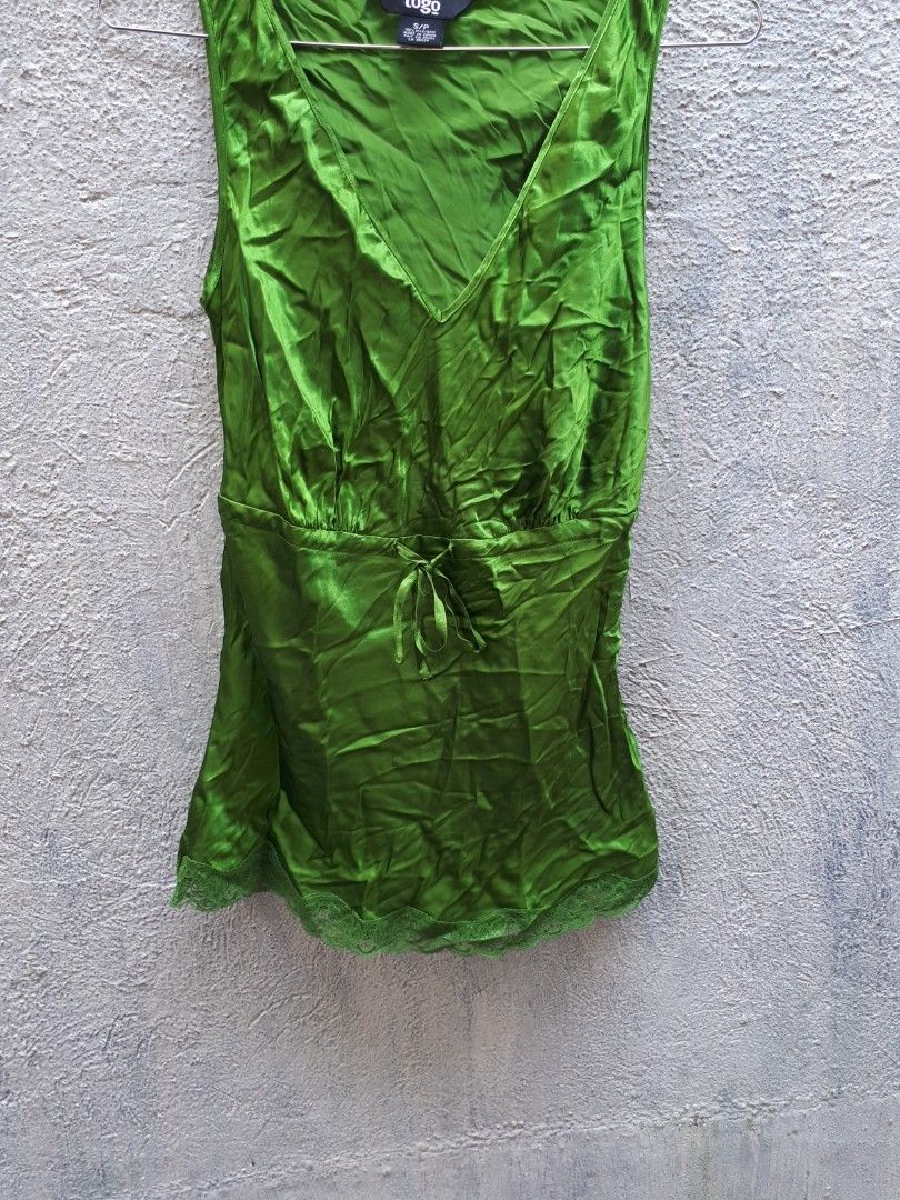 16x27 green silk top (Category: Sleeveless) located in Quezon City. Submitted by secretluxuryshop (Listing ID 1465802577, Image 1). Description: .