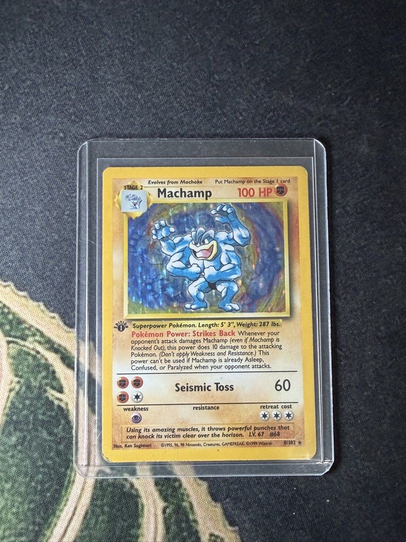 1st Edition Machamp Holo #8/102 (Category: Raw Singles) located in Cavite. Submitted by shakir16_ (Listing ID 1465921546, Image 1). Description: 1st Edition Pokémon Base Set Machamp Holo #8/102 • Base Set Machamp #8/102 • 1st Edition • Holo Rare • Original WOTC-era Pokémon • Actual card shown in photos • Sleeved and in top loader Negotiable for serious buyers. 📦 Shipping available 🤝 Meetup possible.