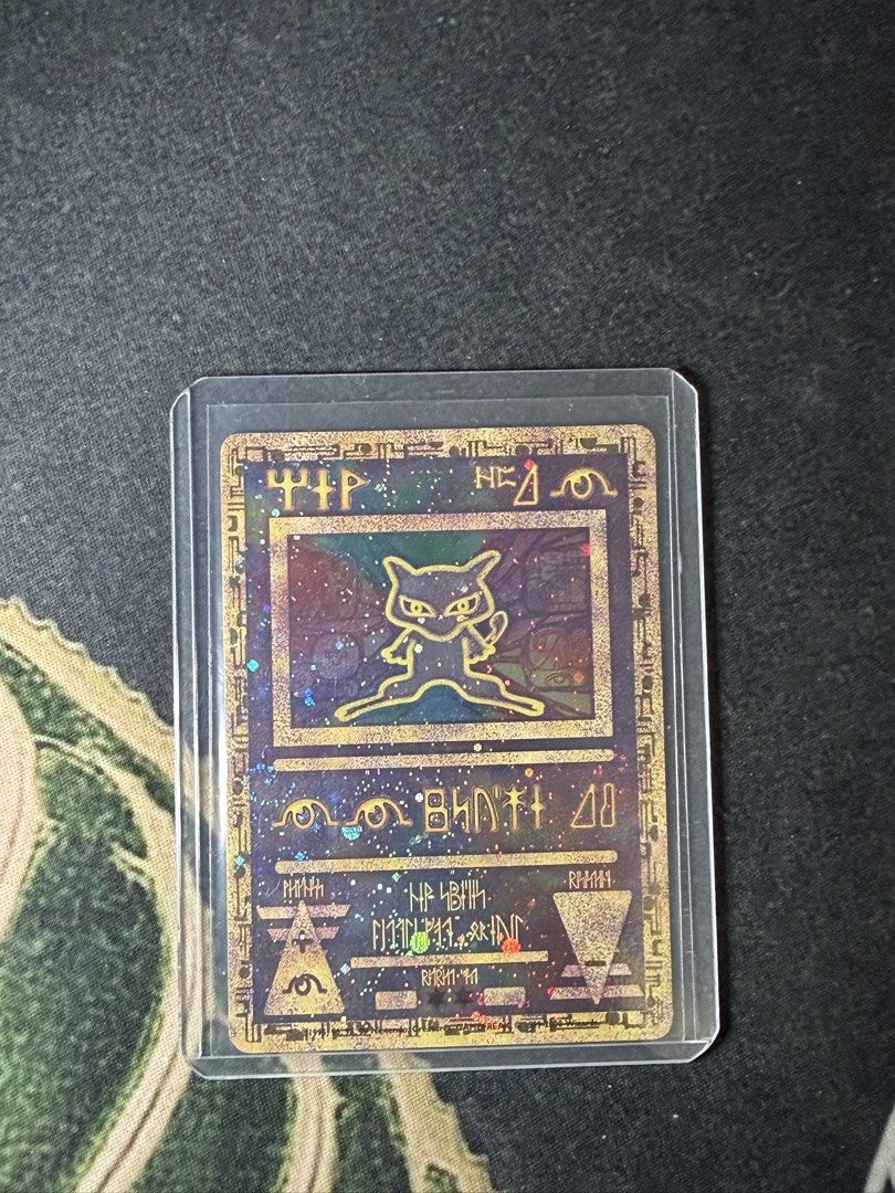 2000 Ancient Mew — Holo Pokémon Promo (Category: Raw Singles) located in Cavite. Submitted by shakir16_ (Listing ID 1465918597, Image 1). Description: 2000 Pokémon Ancient Mew Holo Promo • Ancient Mew • 2000 Pokémon Promo • Holofoil • Original vintage Pokémon card • Beautiful classic artwork • Actual card shown in photos •Sleeved and in top loader Negotiable for serious buyers. 📦 Shipping available 🤝 Meetup possible.