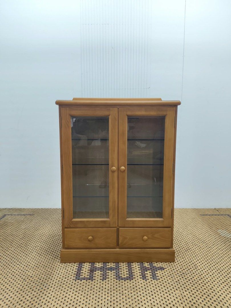 2 door glass display cabinet (Category: Shelves, Cabinets & Racks) located in Quezon City. Submitted by matetdevis13 (Listing ID 1465951789, Image 1). Description: Classic Wooden 2-Door Glass Display Cabinet with 2 Drawers Price: 5,900 L33 x W17 x H45.5 In good condition Code MJS29-TJ114.