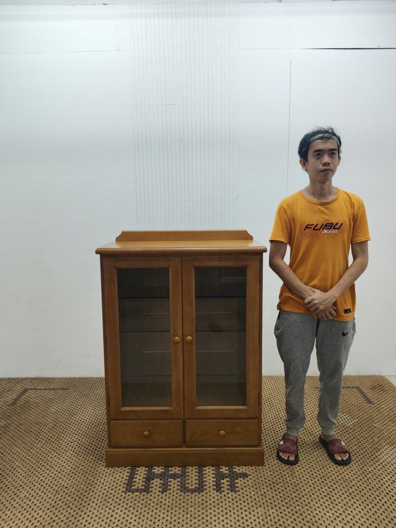 2 door glass display cabinet (Category: Shelves, Cabinets & Racks) located in Quezon City. Submitted by matetdevis13 (Listing ID 1465951789, Image 2). Description: Classic Wooden 2-Door Glass Display Cabinet with 2 Drawers Price: 5,900 L33 x W17 x H45.5 In good condition Code MJS29-TJ114.