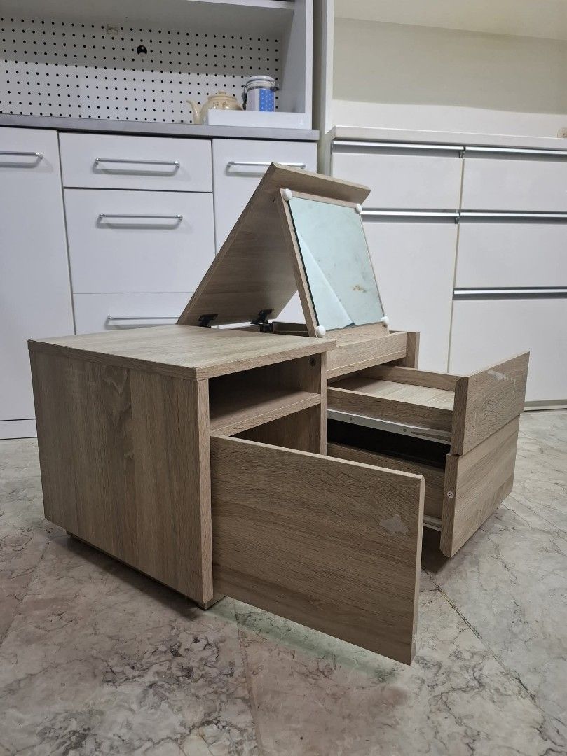 2 in 1 Side Cabinet Vanity Table with Foldable Mirror (Category: Tables & Sets) located in Quezon City. Submitted by dannikkishoppe2 (Listing ID 1465811706, Image 3). Description: 2 in 1 Side Cabinet Vanity Table with Foldable Mirror ‼️₱4000‼️ *compressed wood • Space-saving wooden tabletop vanity with natural wood grain finish • Built-in mirror with adjustable hinges (folds down or props up) • Features a side cabinet with a door for private stor