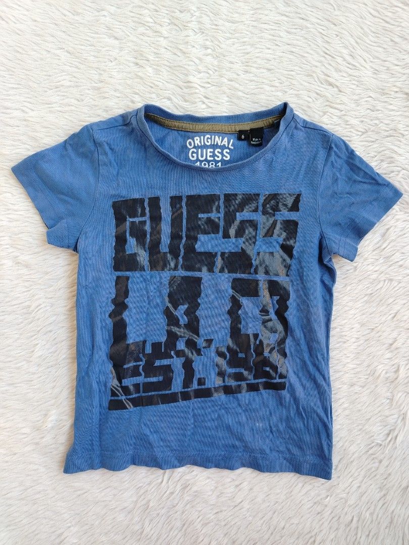 3-4yrs Guess Shirt (Category: Babies & Kids Fashion) located in Paranaque City. Submitted by closetbykimkirsten (Listing ID 1465829590, Image 1). Description: 🎀CANADA BOX🎀 ✨Condition: 8/10 ⚡W: 12/L: 15 & half inches 🪷Size: 3-4yrs old 💸Price: P130(Non Negotiable) ♦️All Items are PRELOVED in good condition. ♦️Please do manage your expectations. ♦️WASH before USE ♦️BUY at your own RISK 🔥NO RETURN NO EXCHANGE POLICY🔥 ⛔BOGUS BUYER/JOY RESERVER w
