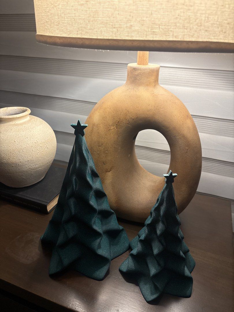 3D Printed Geometric Christmas Tree Decors (Category: Artificial Plants & Flowers) located in Paranaque City. Submitted by sqt_closet (Listing ID 1465948475, Image 1). Description: - 3D printed decorative Christmas trees in a stylish deep green - Sparkly finish with a modern faceted geometric design - Each tree is topped with a charming small star - Varying heights create a beautiful display when paired together - Ideal holiday accent for tableto