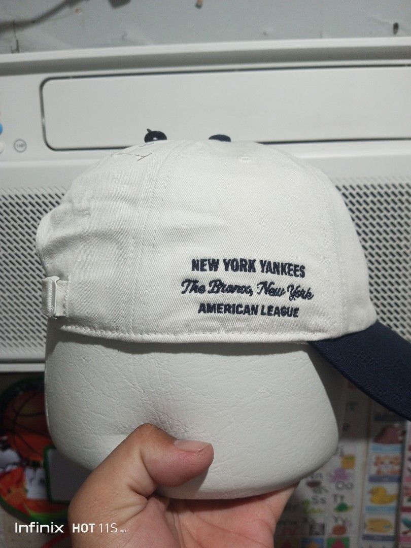 '47 New York Yankees MLB Baseball Cap Hat (Category: Caps & Hats) located in Las Pinas. Submitted by rzzr_thrift25 (Listing ID 1465781002, Image 2). Description: - Brand: '47 Brand - Team: New York Yankees (American League - The Bronx, New York) - Condition: Brand new, unworn with original retail tag ($38.00) and brim sticker attached - Colorway: Two-tone (Off-white crown / Navy blue curved brim) - Details: Embroidered front NY logo, side letteri